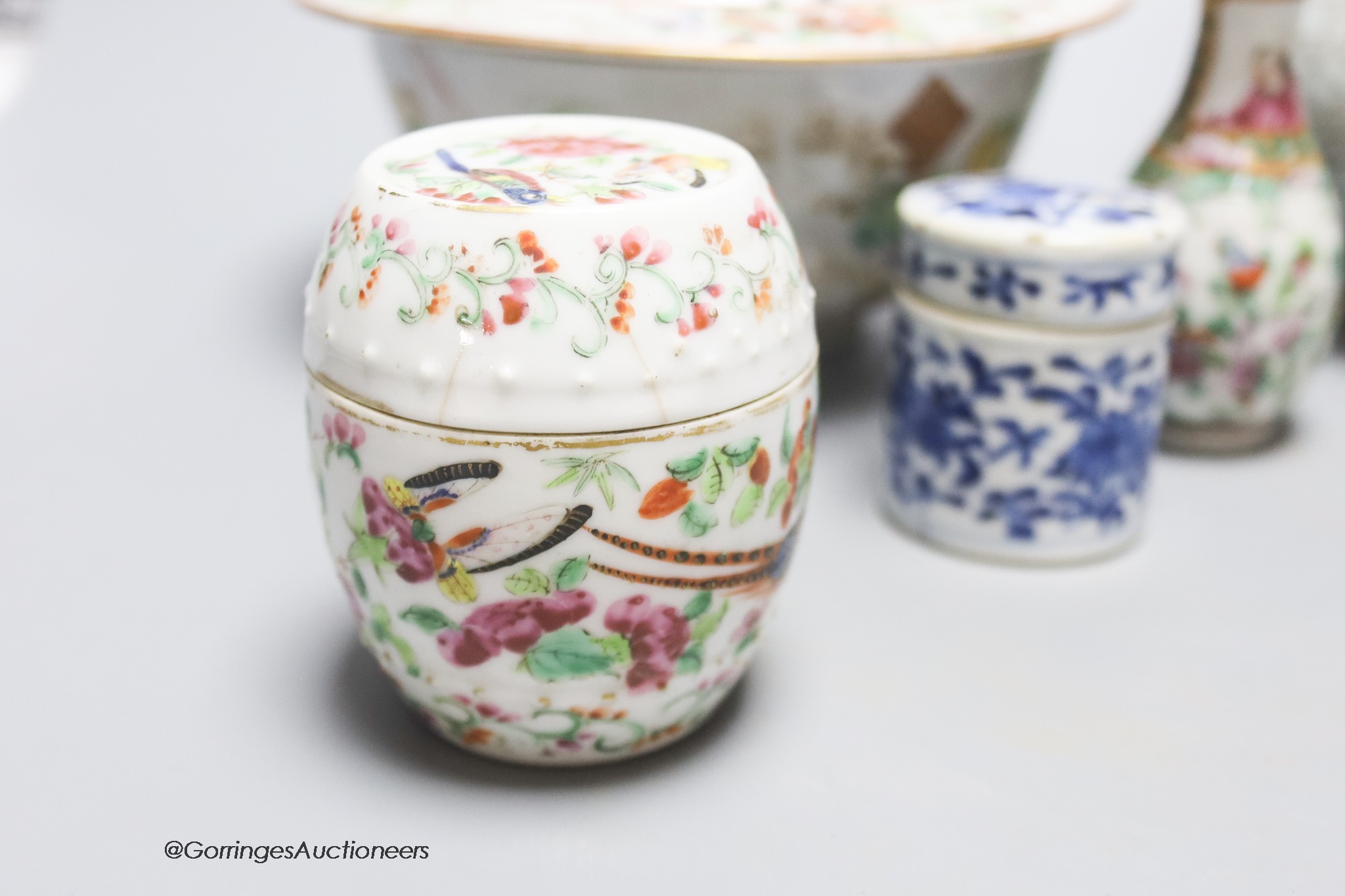 A quantity of mixed Chinese ceramics to include a crackleglaze double gourd vase, three pieces of famille rose porcelain, a blue and white pot and cover, etc. tallest 22cm